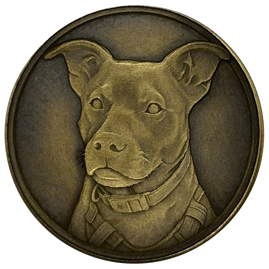 Brass coin embossed with a dog’s portrait